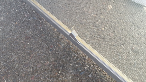 Our team specializes in cleaning window screens like this one.