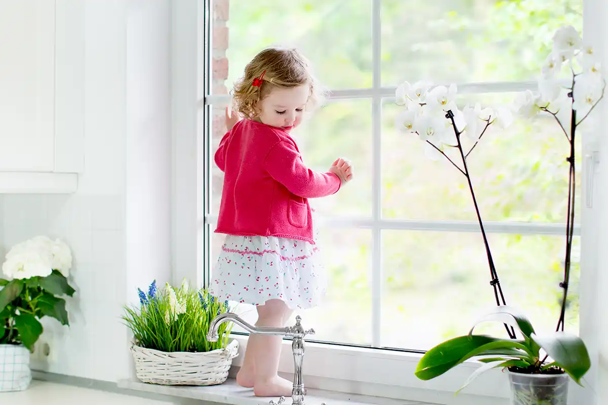 Girl in front of a window
